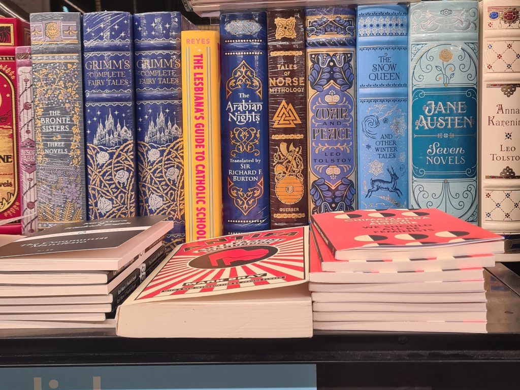 Several of the Penguin Clothbound Classics on a shelf in a library in Maastricht